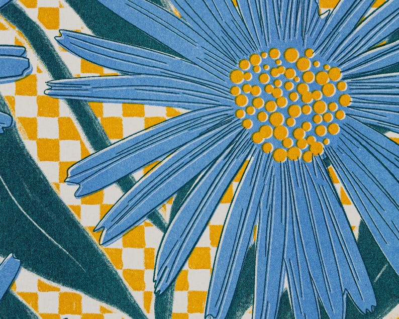 May include: A detailed image of a blue flower with a yellow centre and long petals. The background has a yellow and white chequered pattern and dark green leaves, forming a bright floral design.
