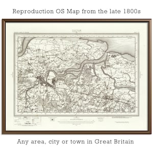 May include: A framed reproduction OS map from the late 1800s featuring the Chatham area. The black and white cartographic print displays detailed topography, river paths, and historical land markings within a dark brown rectangular frame.