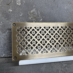 Pure Brass radiator cover - polished or aged  finish possible. Aged brass vent cover