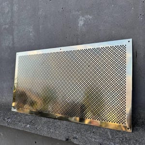 Gepolijst messing vloer- en wandlijsten en ventilatieroosters