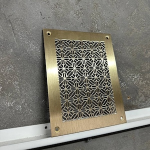 Luchtretourrooster van gepolijst messing voor vloer en muur: gecombineerde elegantie en functionaliteit