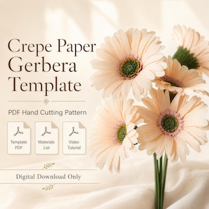 Puede incluir: Una descarga digital para una plantilla de gerbera de papel crepé que incluye un patrón de corte manual en PDF, lista de materiales y tutorial en video. La imagen muestra varias flores de gerbera de papel crepé color melocotón claro.