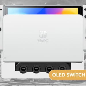 May include: A set of three ceramic mugs with a speckled, matte finish. The mugs are in shades of cream, light gray, and dark gray. Each mug has a simple, minimalist design, perfect for coffee or tea.