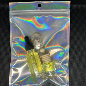 Hanging car diffuser and refill bottle kit