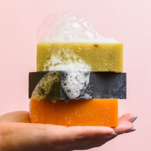 zero waste soap bars in hand plastic-free soap natural soap bars