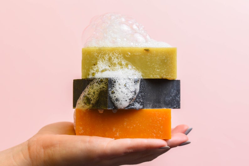 zero waste soap bars in hand plastic-free soap natural soap bars