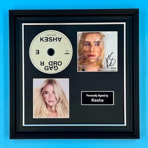 Kesha Signed Photo & CD In Luxury Handmade Wooden Frame With AFTAL Member Certificate Of Authenticity Poster Music Memorabilia Autograph