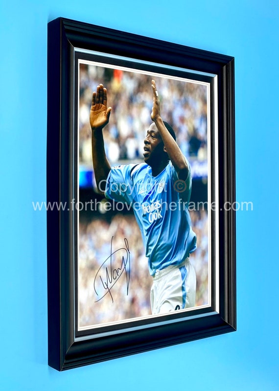 Autographed hotsell football memorabilia
