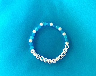 Pulsera elástica con cuentas "Huelo a nieve": Joyería de invierno elástica azul y blanca