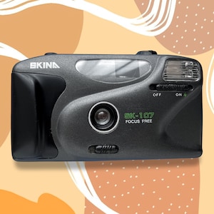 Vintage Skina SK-107 Film Camera: Compact 35mm, Automatic Flash
