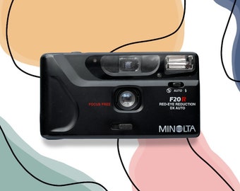 Fotocamera Minolta F20R: una fotocamera vintage da 35 mm punta e scatta