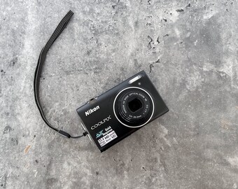 Nikon カメラ Amazon.com : Nikon Coolpix S51 8.1MP Digital Camera with 3x