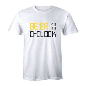 May include: White t-shirt with a black and yellow graphic that reads "BEER O'CLOCK PM AM".
