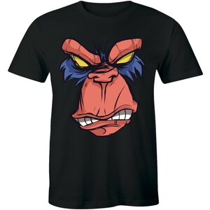 May include: Black t-shirt with a graphic of a red and blue gorilla face with a menacing expression.