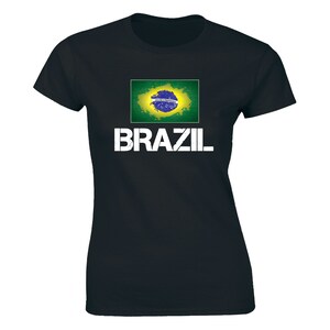 May include: Black t-shirt with a distressed white "BRAZIL" text and a green, yellow, and blue Brazilian flag graphic.