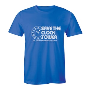 May include: A royal blue t-shirt with a white graphic of a clock tower and the text "Save the Clock Tower" and "Hill Valley Preservation Society".