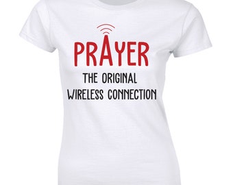 May include: White t-shirt with red text that reads "PRAYER THE ORIGINAL WIRELESS CONNECTION" and a red wifi symbol above the word "PRAYER".