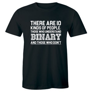 May include: Black t-shirt with white text that reads "THERE ARE 10 KINDS OF PEOPLE: THOSE WHO UNDERSTAND BINARY AND THOSE WHO DON'T"