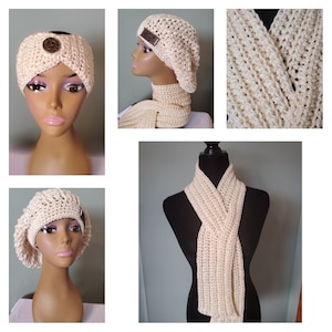 May include: A set of three crocheted items in a cream color. The set includes a beret, a headband, and a scarf. The beret and headband have a textured design, while the scarf has a simple stitch pattern. The scarf is shown draped over a black mannequin.