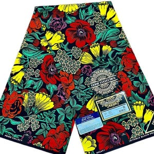 May include: A black fabric with a colourful floral print. The fabric features red, yellow, green, and pink flowers on a black background. The fabric has the text "PRIME COLLECTION" and "IRRITABLE BLOCK PRINTS PRIME COLLECTION" printed on it.