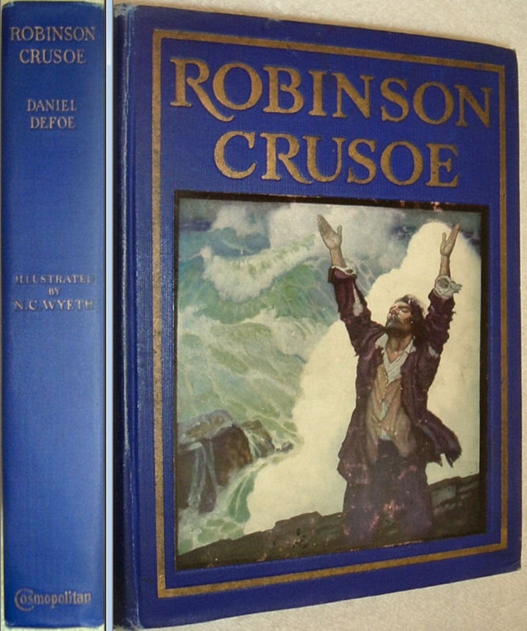 ROBINSON CRUSOE by Daniel Defoe Published by Cosmopolitan Corp Illus by ...