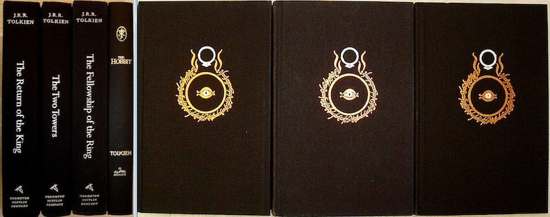 May include: A set of five hardback books with black covers and gold lettering. The books are titled "The Fellowship of the Ring", "The Two Towers", "The Return of the King", and "The Hobbit".