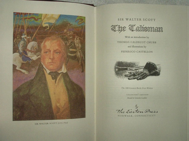 May include: A book cover with a portrait of Sir Walter Scott, the author of "The Talisman". The cover is illustrated with a scene from the book, featuring a knight on horseback. The book is part of "The 100 Greatest Books Ever Written" collection, published by The Easton Press.