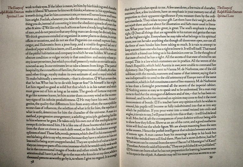 May include: Open book with text on two facing pages. The text is in English, with the title "The Essays of Ralph Waldo Emerson" and "Spiritual Laws" visible. The pages are aged, with visible text and a classic literary theme.