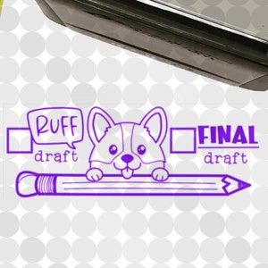 May include: Two black and grey rubber stamps with white text. The top stamp says "mrs. wu Likes this!" and features a cartoon image of a woman with her fist raised. The bottom stamp is blank. A purple stamp with a cartoon dog and a pencil says "RUFF draft FINAL draft". A blue and white sticker with a pineapple says "A Small World Called kindergarten".