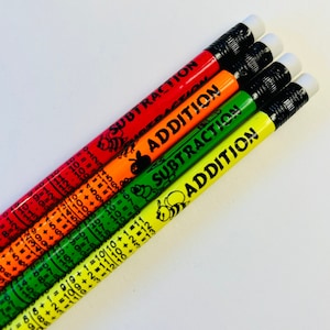 May include: Four pencils with colorful bodies and black text. The pencils are labeled "Addition" and "Subtraction" with bee illustrations. The pencils have black erasers.