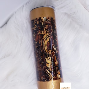 Brown leather cup with gold edges