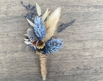 Bouquet made of dried flowers for the groom in smoke blue/cream