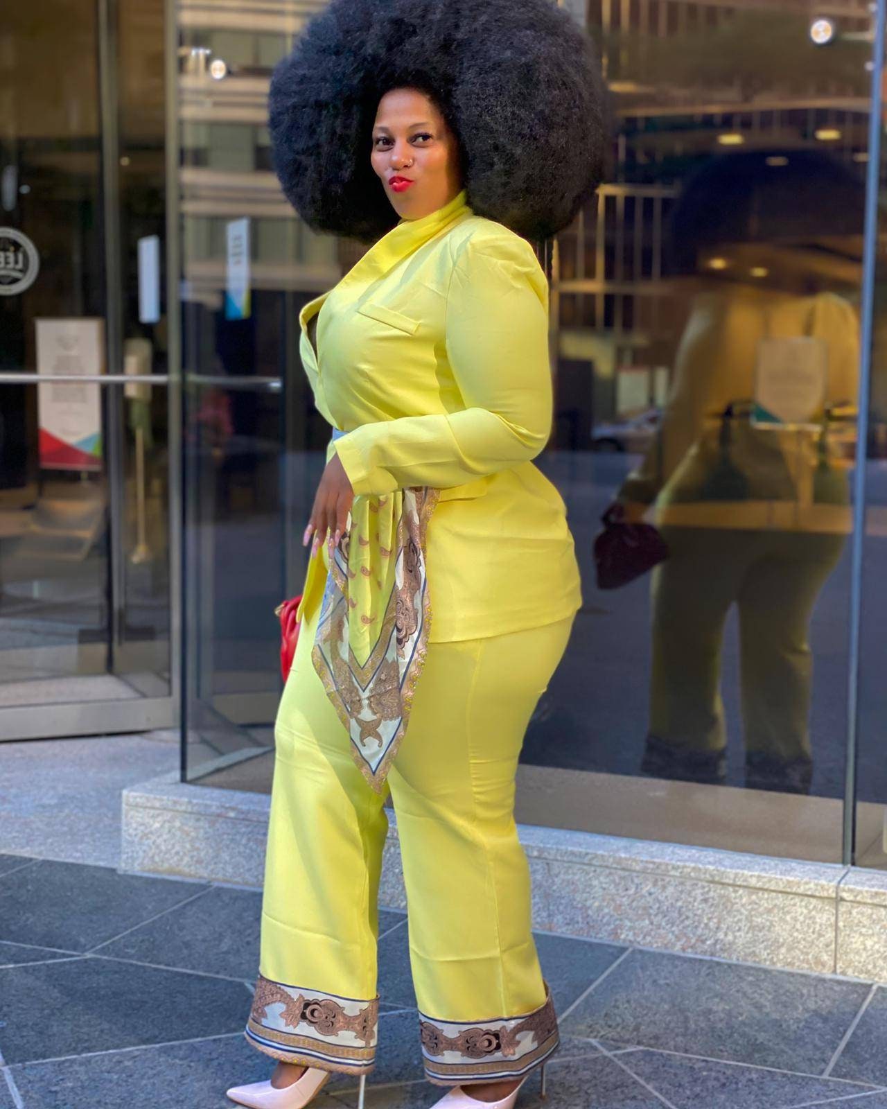 Pastel yellow shop suit