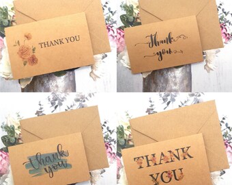 May include: Four brown kraft paper thank you cards with envelopes. The cards feature different designs, including floral, handwritten, and watercolor.