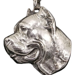 May include: Silver-toned keychain featuring a detailed, three-dimensional head of an American Bully dog breed. The keychain has a silver-toned split ring and a chain.