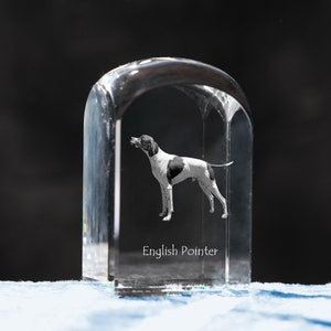 May include: A clear glass paperweight with a black and white image of an English Pointer dog inside. The text "English Pointer" is engraved on the bottom of the paperweight.