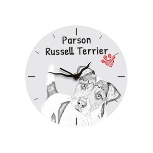 May include: A white clock with black hands and a black and white illustration of a Parson Russell Terrier. The clock face says "Parson Russell Terrier" with a red paw print and heart.