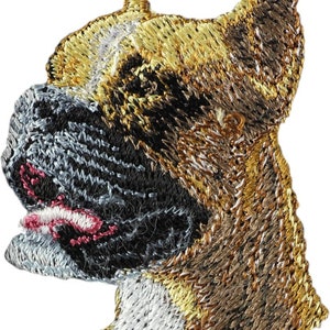 May include: Embroidered patch of a brown and white boxer dog head with a black nose and pink tongue. The dog is looking to the right.