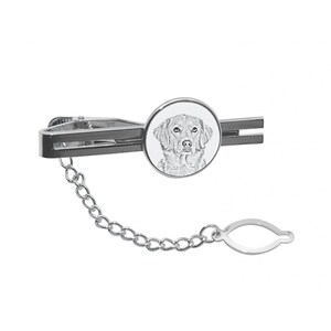 May include: Silver tie clip with a round, white enamel charm featuring a black and white engraved image of a dog's head.