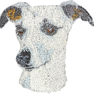 May include: Embroidered patch of a white and black dog's head with brown eyes. The dog has floppy ears and a black nose.