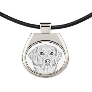 May include: A silver pendant necklace with a black leather cord. The pendant features a round image of a dog's head in black and white.