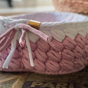 A pink handmade heart basket, a Christmas gift