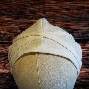 Simple 13th to 15th century St. Brigitta cap, made of white linen