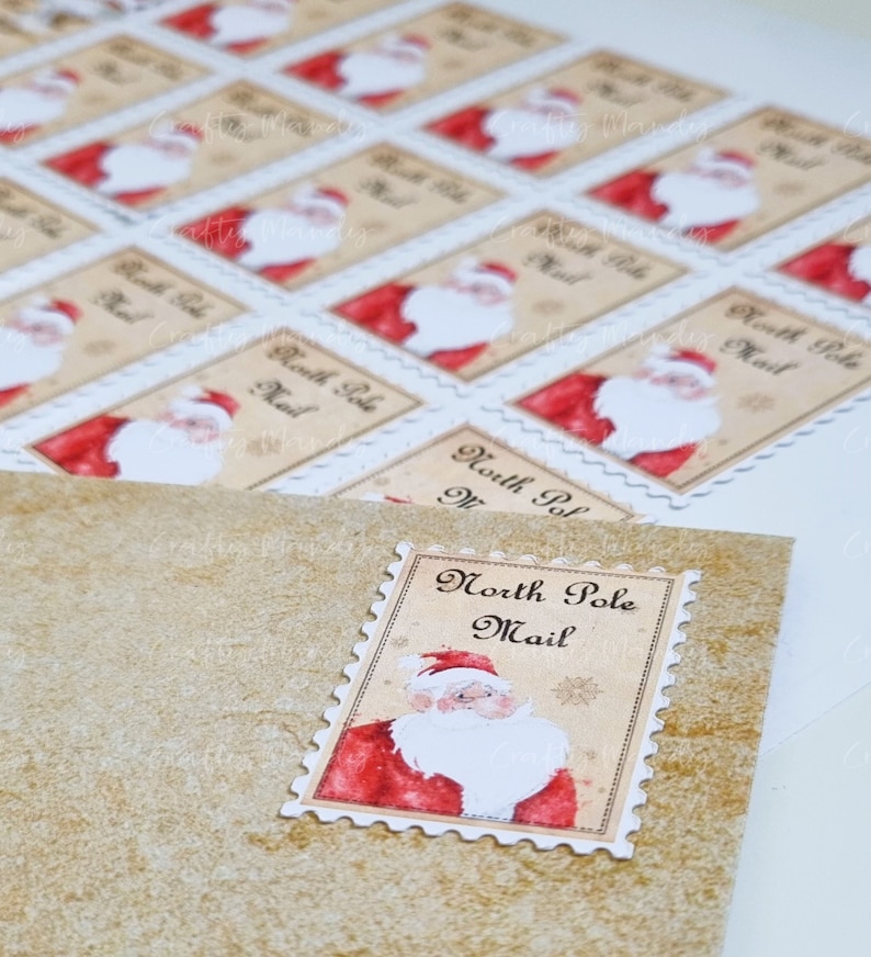 May include: A sheet of red and white North Pole Mail stickers featuring a  Santa Claus illustration. The stickers are printed on high quality sticker paper.