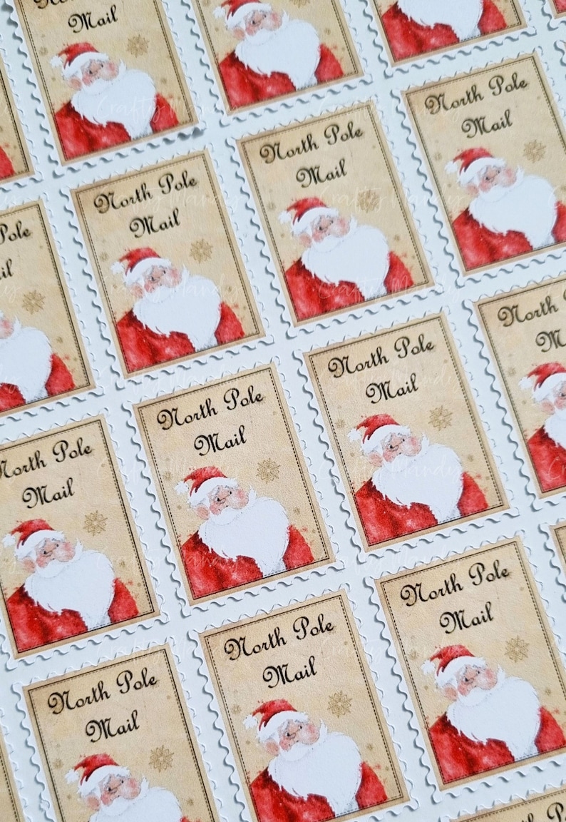 May include: A sheet of 12 festive, white-bordered, red and gold Christmas stickers featuring a cartoon Santa Claus with the text "North Pole Mail".