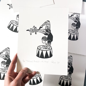 Tattooed Acrobat with Hoops