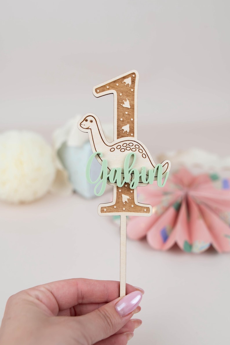Personalized wooden dino cake topper with acrylic name – perfect for first birthdays and children's dino-themed parties image 1