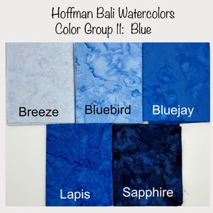 May include: Hoffman Bali Watercolors Color Group II: Blue. Five fabric swatches in shades of blue, from light to dark: Breeze, Bluebird, Bluejay, Lapis, Sapphire.