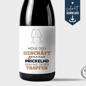 May include: A black wine bottle with a white label featuring text in German and two champagne glasses. The label reads "Möge dein Geschäft genauso prickelnd sein wie dieser Tropfen." A blue banner says "sofort DOWNLOAD."