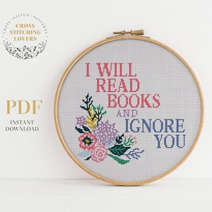 May include: A cross stitch pattern featuring a floral design and the text "I will read books and ignore you".